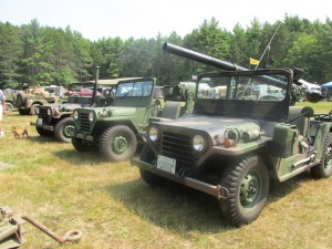 W (left to right) Jim Millers M151A2, Larry Damour's M151A1 search light,and M151A1C